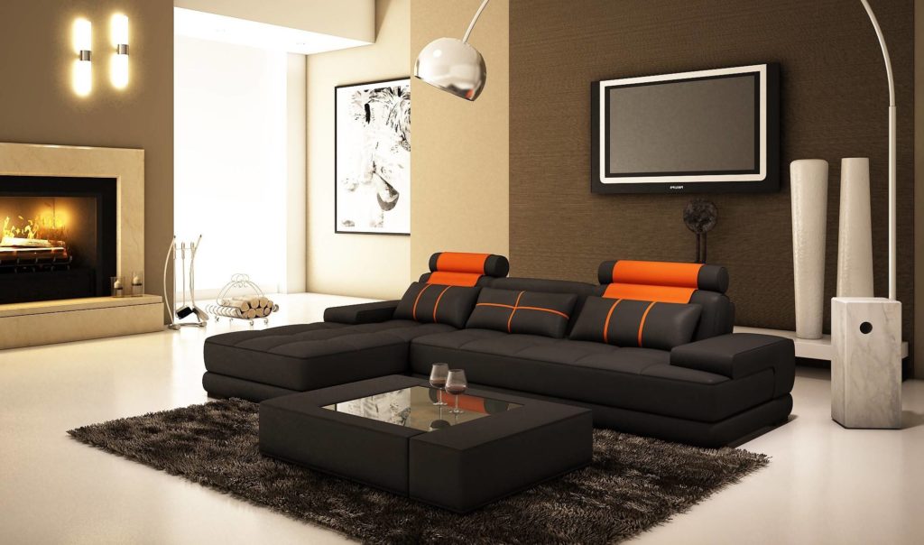 Угловой диван в интерьере гостиной с камином и телевизором