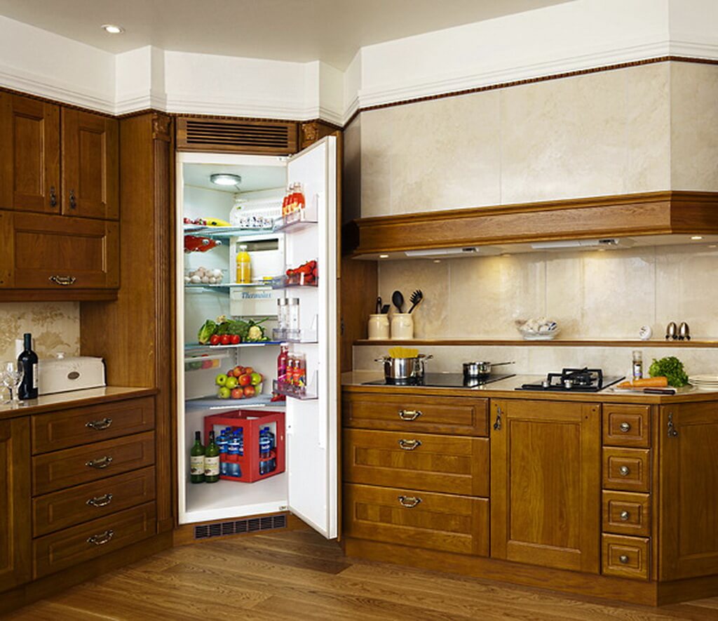 Фото кухонного гарнитура с встроенным холодильником в шкафу