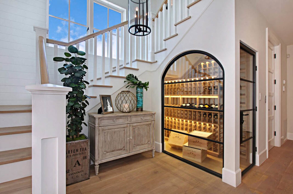 Шкаф для вина встроенный под лестницей